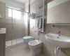 Bathroom with wide shower