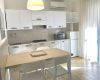 Living/dining room with kitchenette