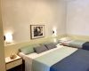 Schlafzimmer mit 3 Einzelbetten